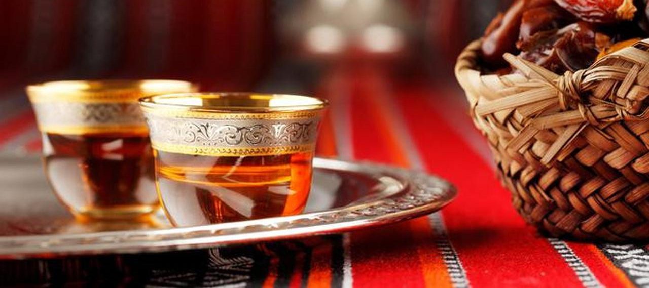 Arabic coffee dallah with dates and tahini
